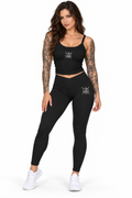 AI-generated tattooed female model wearing Women’s Luxe Leggings with Gothic Spider Emblem